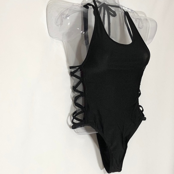 iHeartRaves Tops - 🌞🌞NWT iHeartRaves Side Cutout Bodysuit  $30 OBO